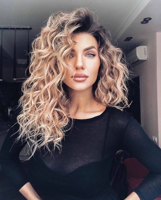 Mid-Length Curly Haircut 2023 with Curly Bangs